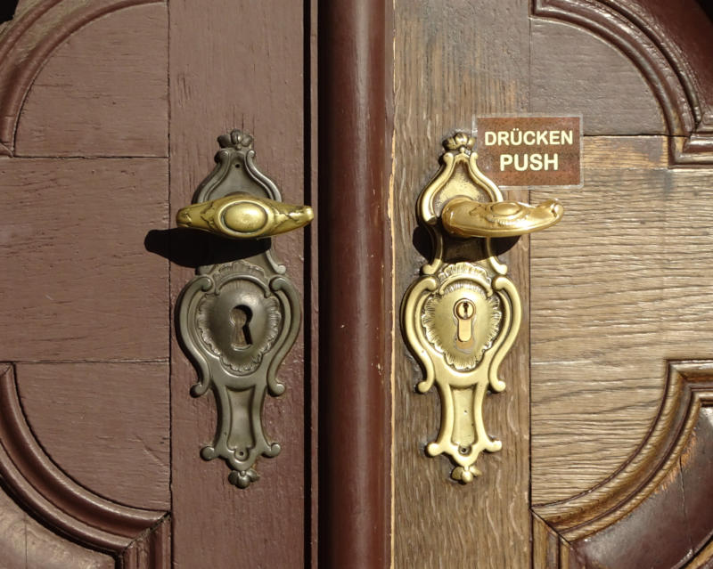 I wonder which door handle gets used more?